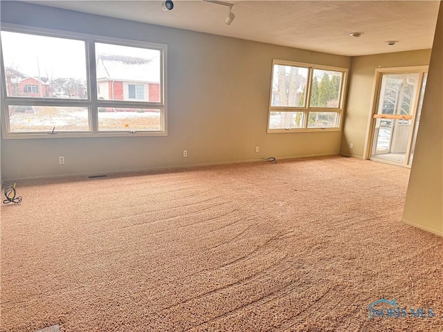 empty room featuring carpet