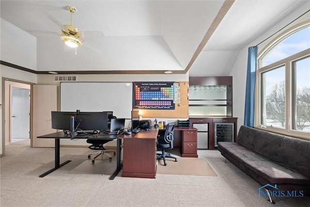 office space featuring light carpet, wine cooler, high vaulted ceiling, and ceiling fan