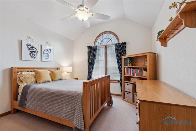 bedroom with light carpet, vaulted ceiling, and ceiling fan