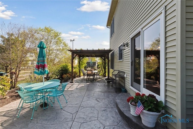 view of patio / terrace featuring a pergola