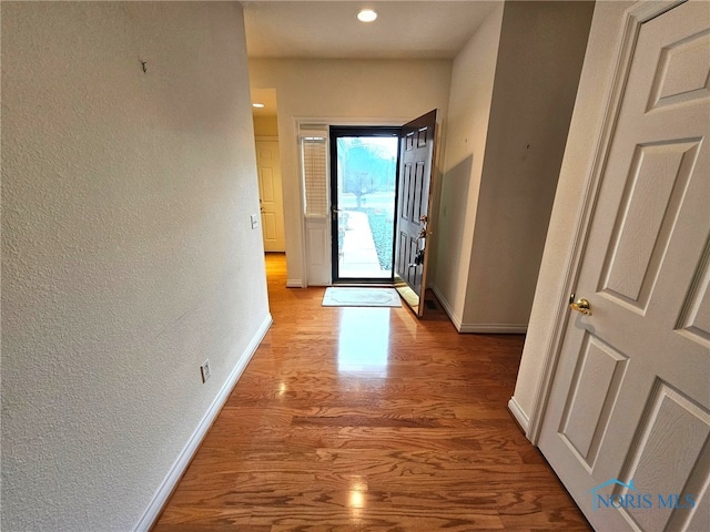 hall featuring light hardwood / wood-style flooring