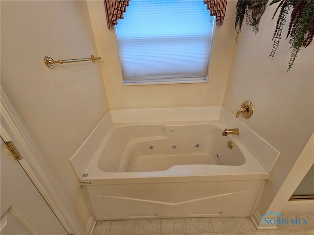 bathroom featuring a washtub