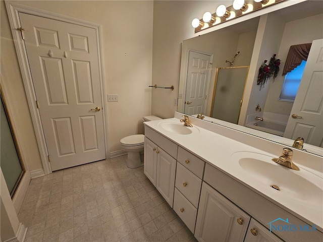 full bathroom with plus walk in shower, vanity, and toilet