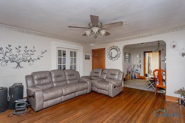 living room featuring french doors, ceiling fan, and wood-type flooring