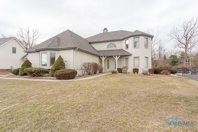 view of front property with a front lawn