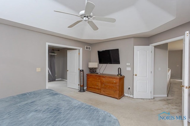 bedroom with light colored carpet and ceiling fan