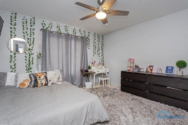 bedroom featuring ceiling fan