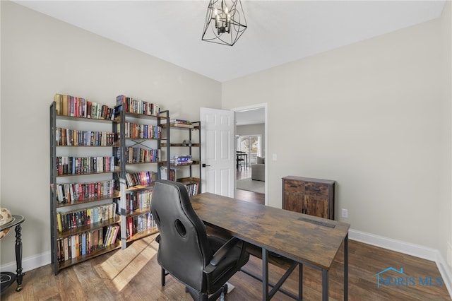 office with dark hardwood / wood-style flooring