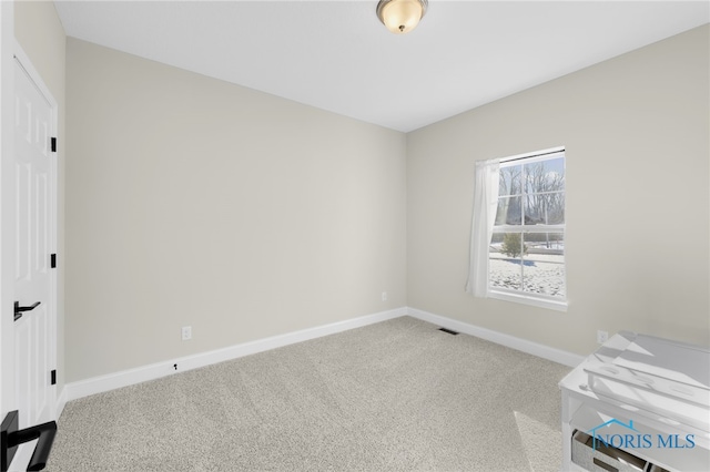 unfurnished bedroom featuring carpet flooring