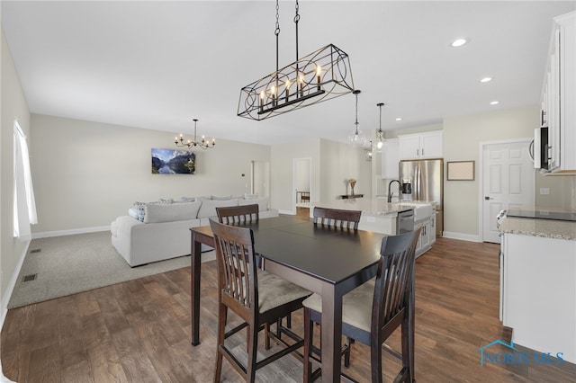 dining space featuring dark hardwood / wood-style floors