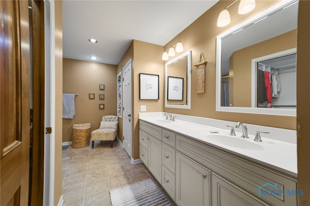 bathroom with vanity and tile patterned floors