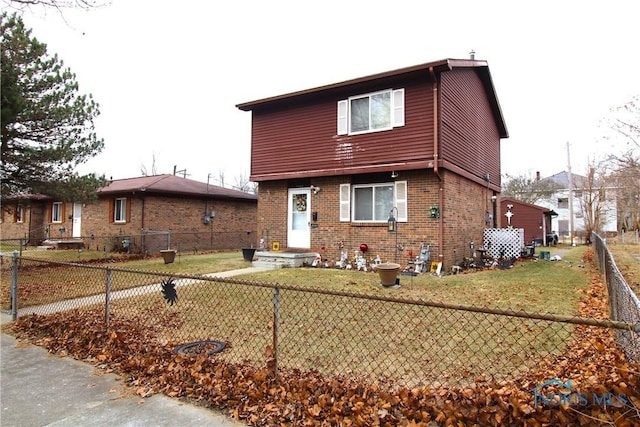 view of property with a front lawn