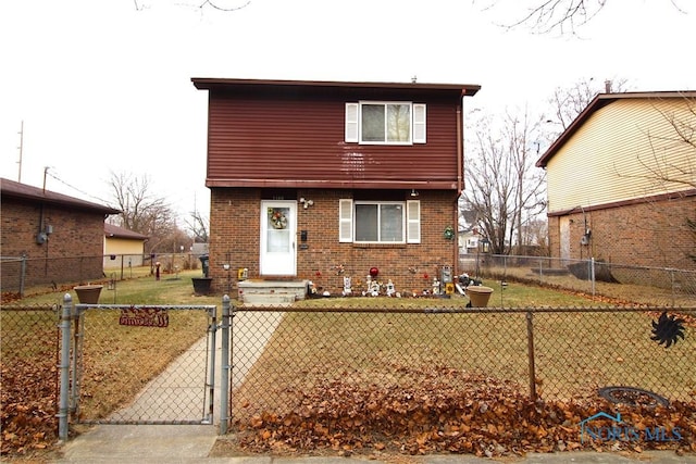 view of front facade with a front yard