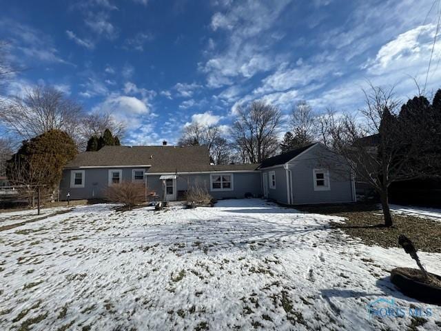 view of snow covered property