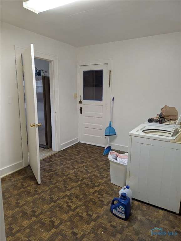 laundry room featuring laundry area and baseboards