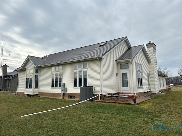 back of house with a patio, a yard, and central AC unit