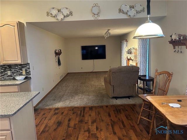 living room featuring dark hardwood / wood-style flooring