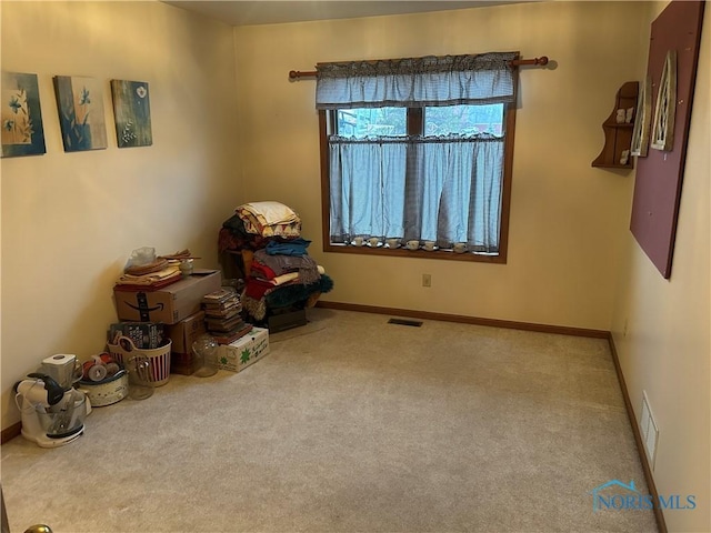 interior space featuring light colored carpet