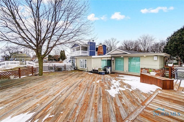 wooden terrace with central AC unit