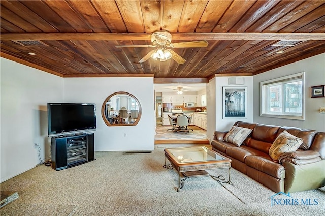 living room with carpet flooring, wooden ceiling, and ceiling fan