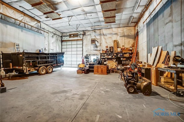 garage featuring a workshop area