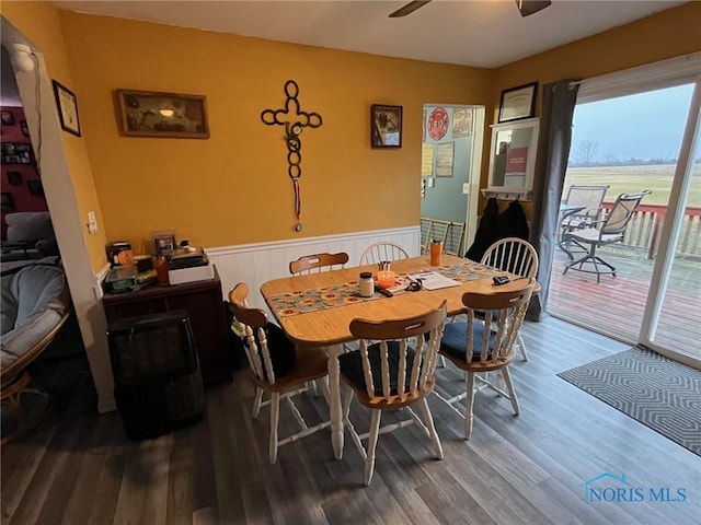 dining area featuring ceiling fan and hardwood / wood-style floors