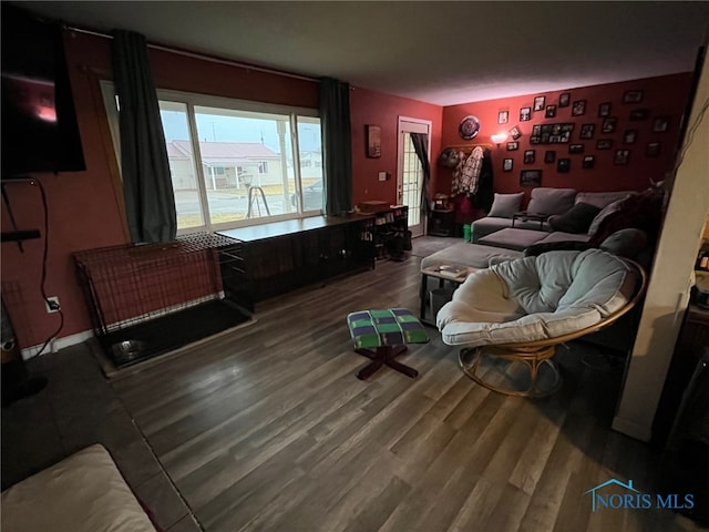 cinema room with hardwood / wood-style flooring