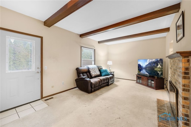 carpeted living room with a fireplace and beam ceiling