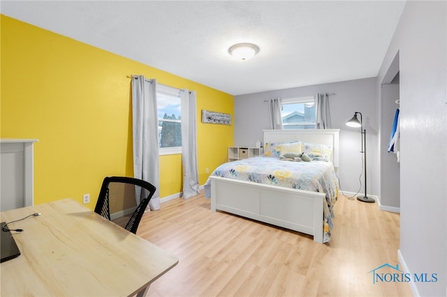 bedroom featuring light hardwood / wood-style floors