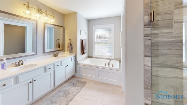 bathroom with vanity, tile patterned flooring, and separate shower and tub