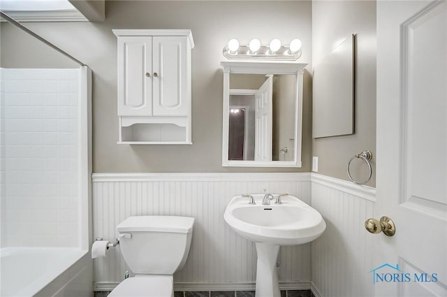 bathroom with sink and toilet