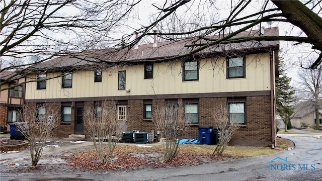 view of property with central air condition unit