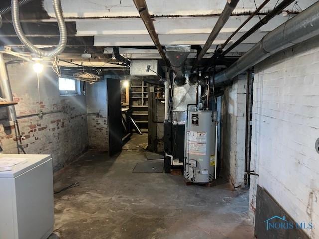 basement featuring washer / dryer and water heater