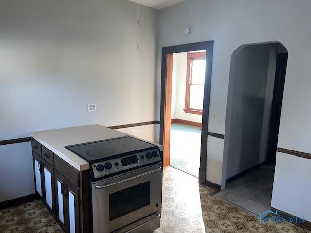 kitchen featuring stainless steel electric range oven