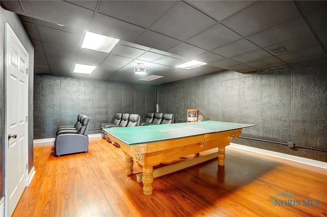 rec room with billiards, a paneled ceiling, and light hardwood / wood-style floors