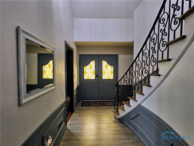 entrance foyer featuring french doors