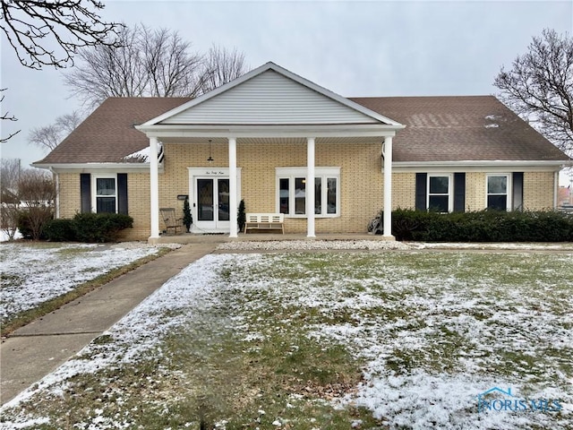 view of front facade featuring french doors