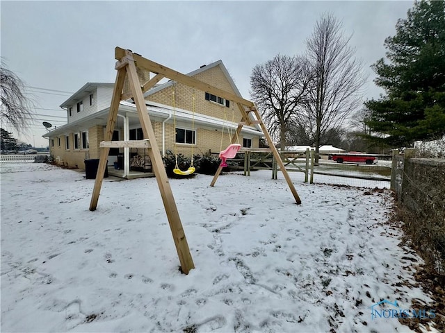 view of snow covered playground