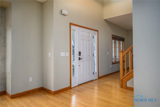 entrance foyer with light wood-type flooring