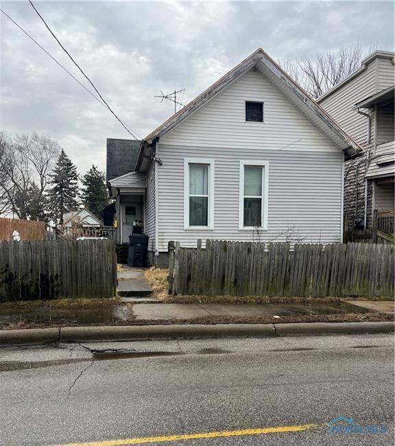 view of home's exterior with a fenced front yard