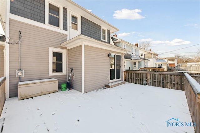 view of snow covered property