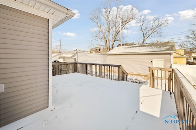 view of snow covered deck