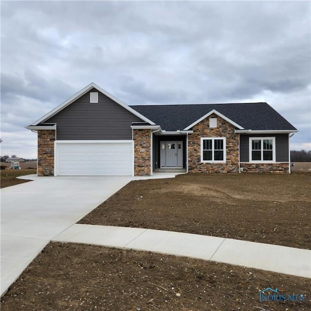 view of front of home with a garage