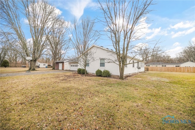 view of yard featuring a garage