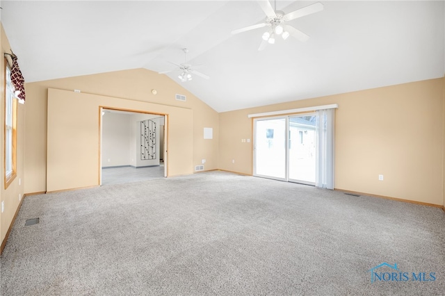 unfurnished living room featuring light carpet, lofted ceiling, and ceiling fan