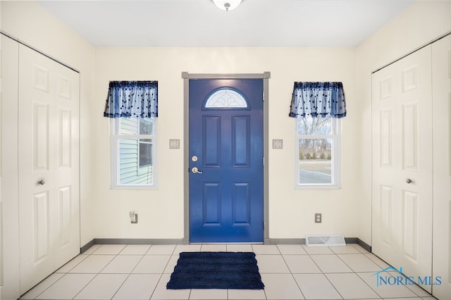 view of tiled foyer entrance