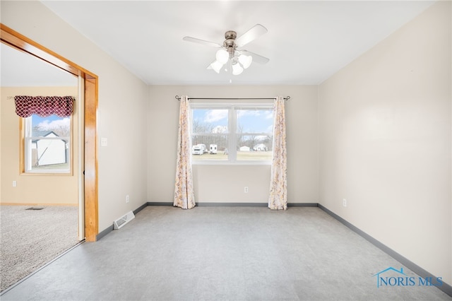 spare room featuring ceiling fan