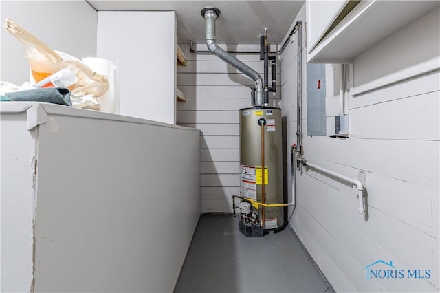 utility room with gas water heater