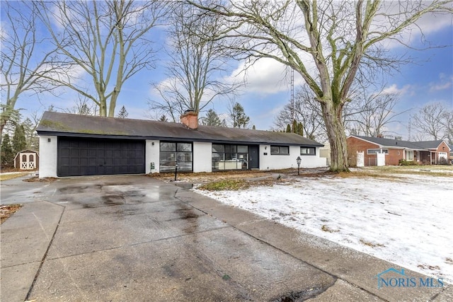 single story home with a garage