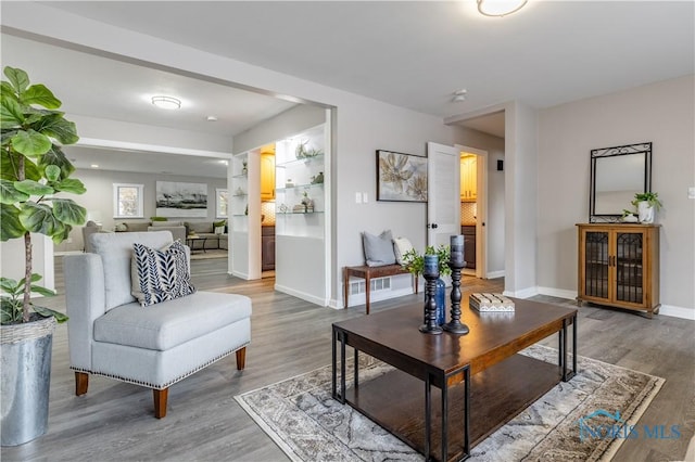 living room with hardwood / wood-style floors